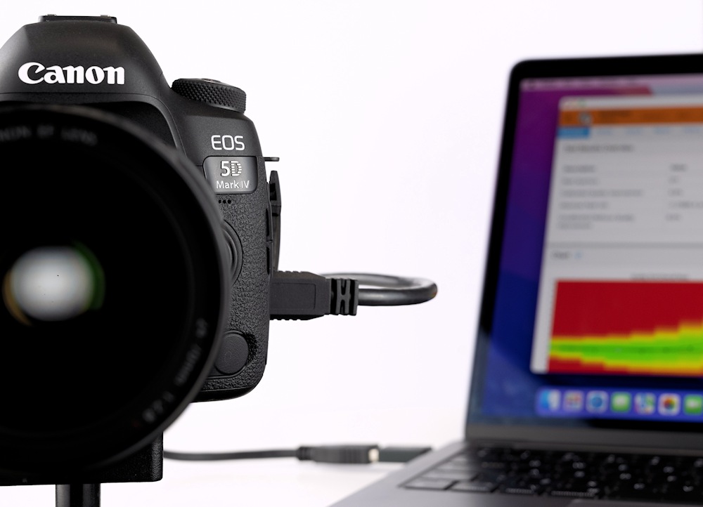 A Canon EOS 5D Mark IV tethered to a Mac running Reikan FoCal
